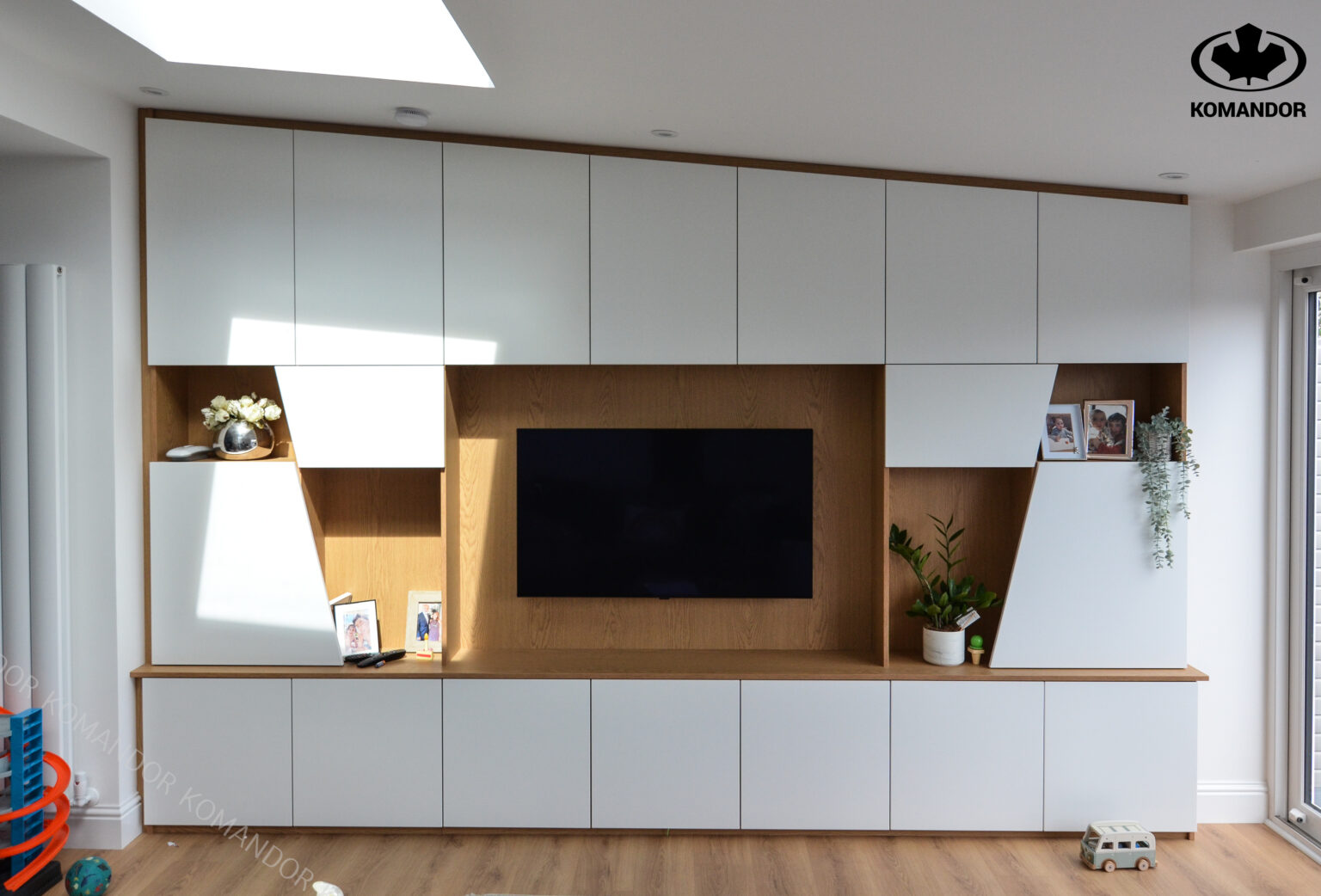 Custom Media Wall with integrated TV unit and storage by Komandor Scotland