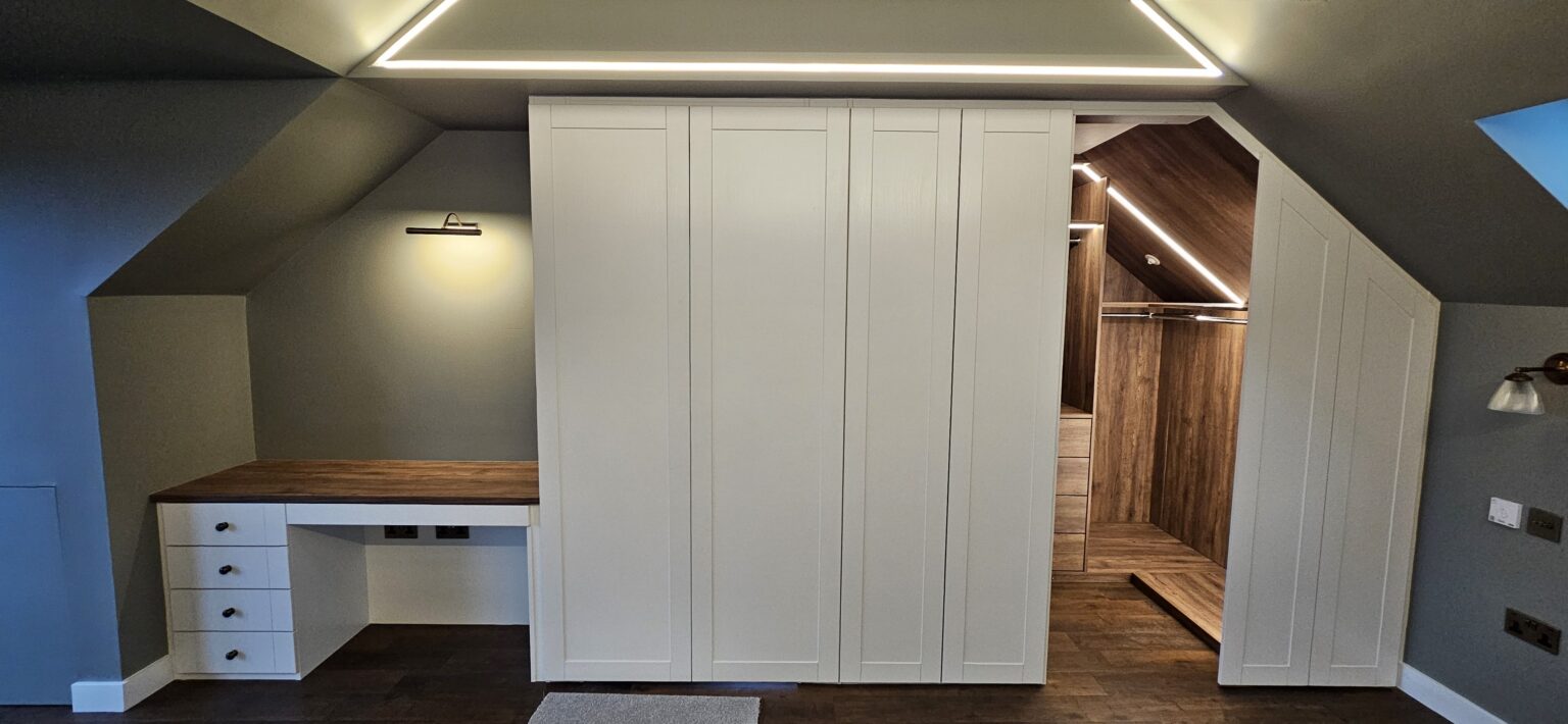 Attic Walk In Wardrobe with Sloped Ceiling by Komandor Scotland Attic walk in wardrobe with sloped ceiling by Komandor Scotland, made to measure for awkward angles.