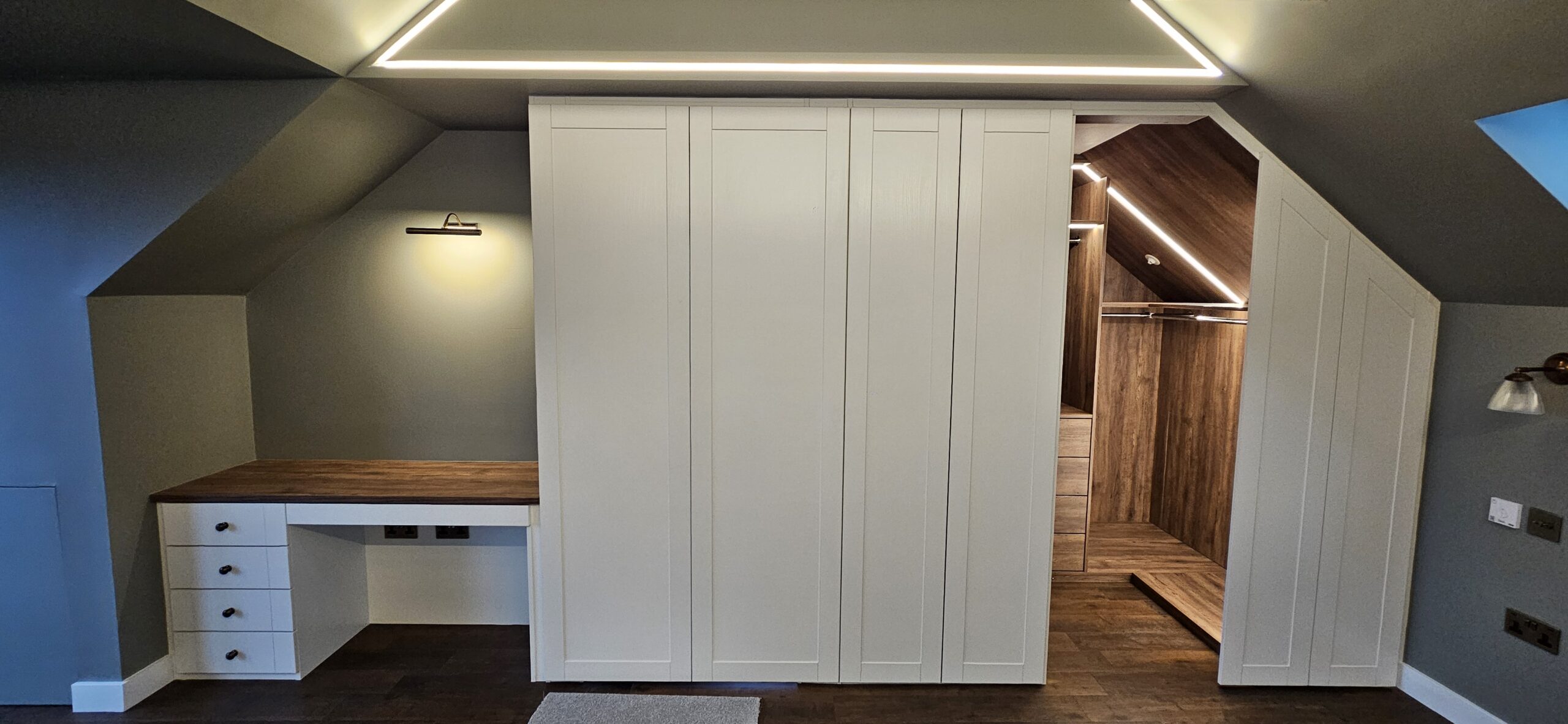 Attic walk in wardrobe with sloped ceiling by Komandor Scotland, made to measure for awkward angles.