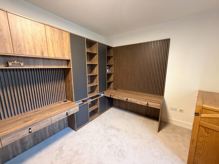 Bespoke home office in Grandhome, Aberdeen with two workstations, slat wall panelling and dark contrast cabinets