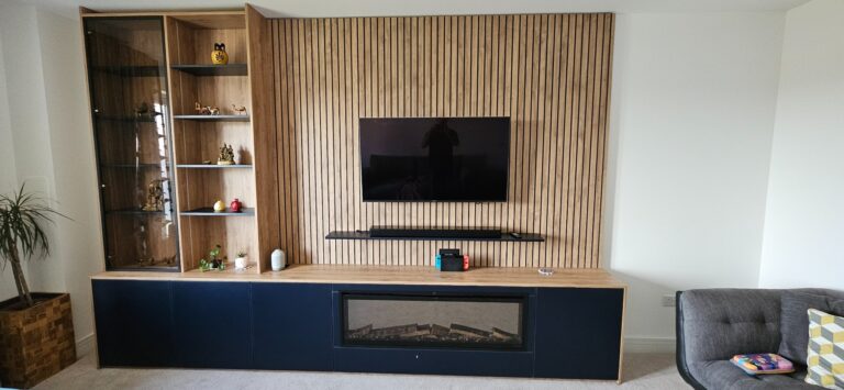 Bespoke living room media unit with slat wall panelling and integrated fireplace in Grandhome, Aberdeen