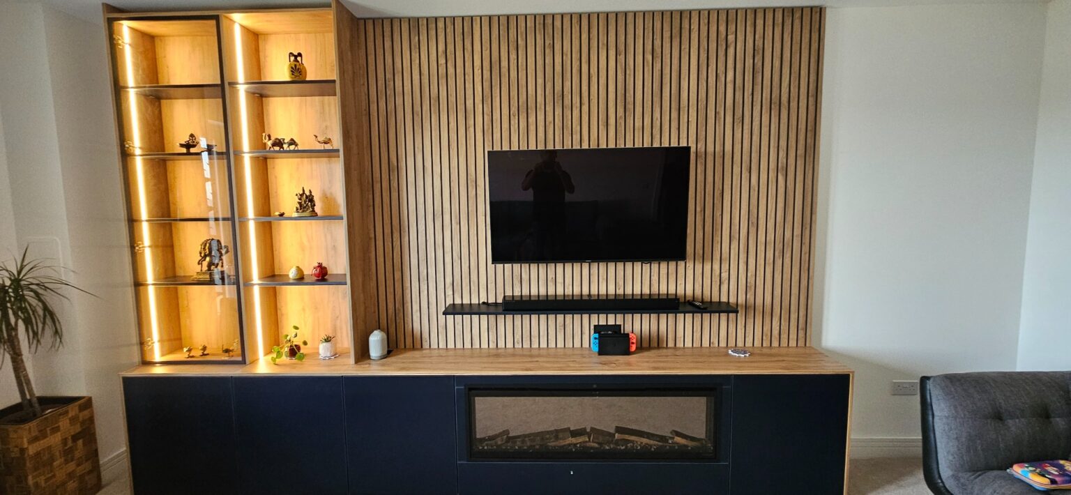 Bespoke Media Unit in Grandhome, Aberdeen 12 Vertical LED lighting highlighting the display shelving of a bespoke media unit
