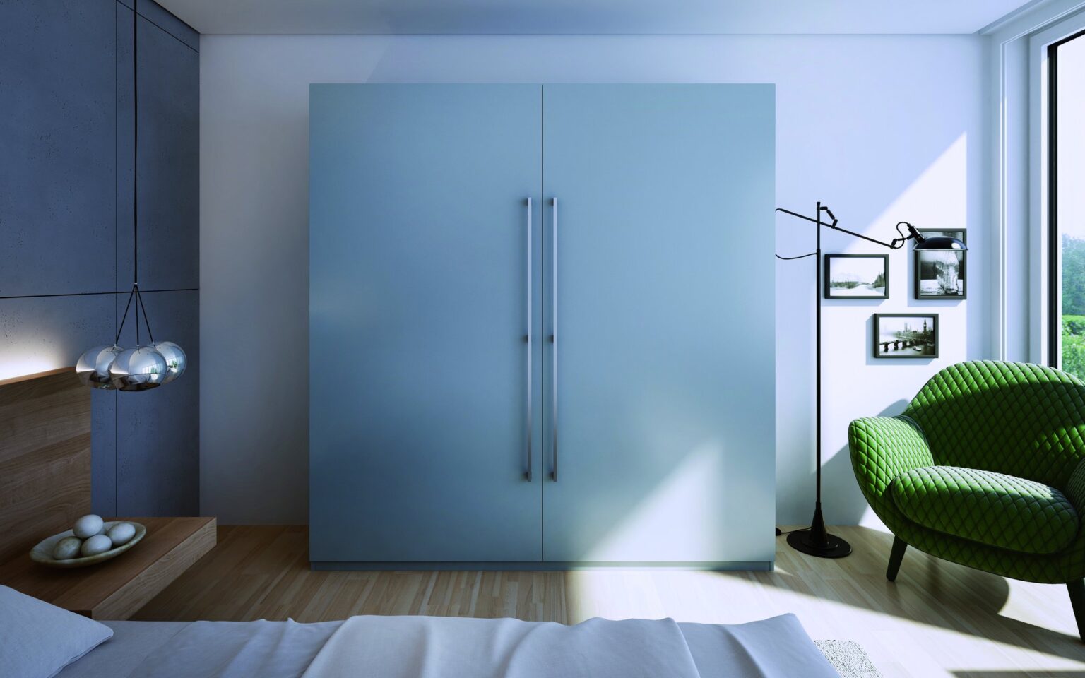 Light blue sliding wardrobe in a bedroom by Komandor Scotland
